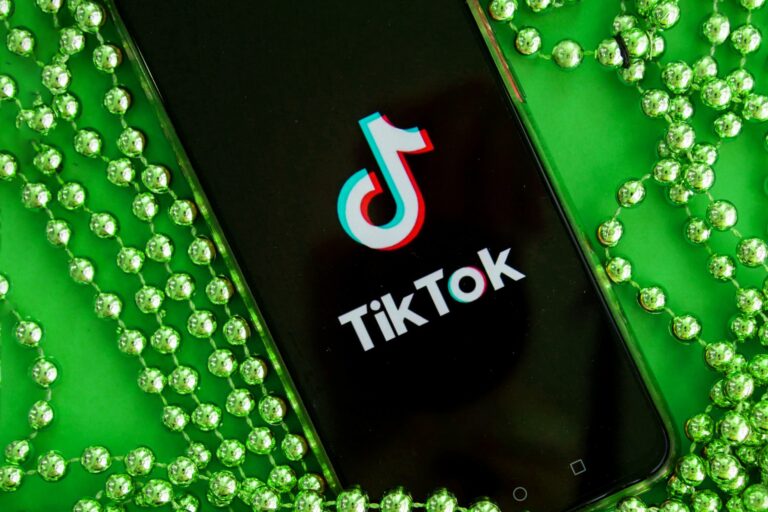 TIKTOK logo on the screen of a mobile phone